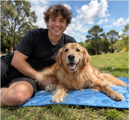 Man with his golden retriever on the Arctic Freeze Mat outdoors